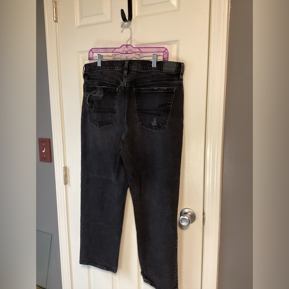 Black stretch American Eagle jeans with a ripped knee-size 14 regular - Picture 7 of 7